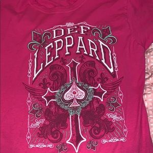 Pink, shortsleeved Def Leppard shirt. Size S/M